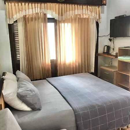 פדנגבאי Kayuna Homestay מראה חיצוני תמונה