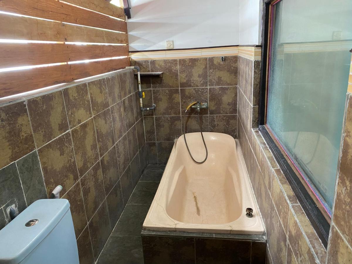 פדנגבאי Kayuna Homestay מראה חיצוני תמונה