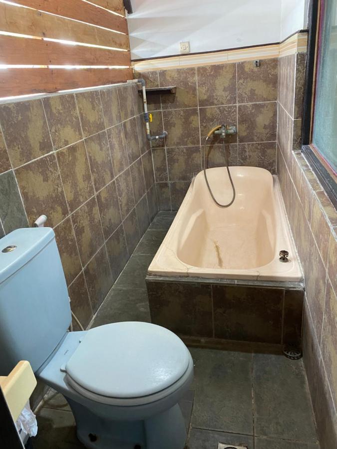 פדנגבאי Kayuna Homestay מראה חיצוני תמונה