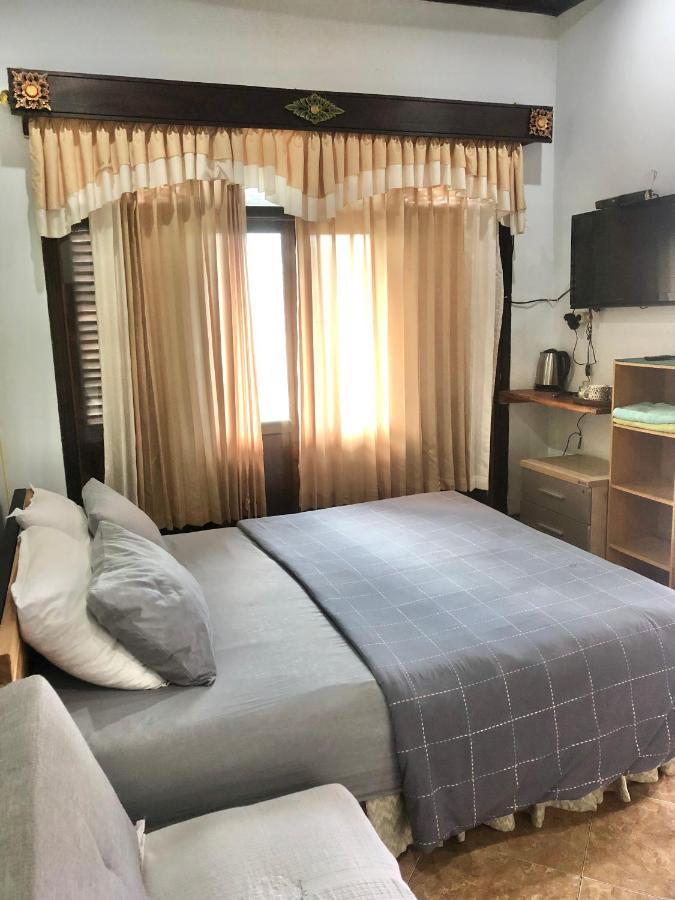 פדנגבאי Kayuna Homestay מראה חיצוני תמונה